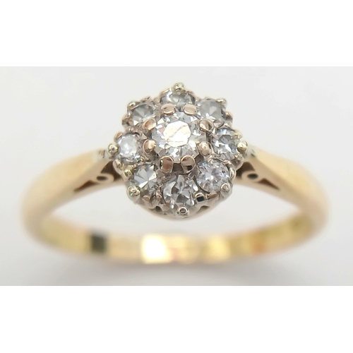 172 - A 18K YELLOW GOLD & PLATINUM VINTAGE DIAMOND CLUSTER RING. 0.25CT. TOTAL WEIGHT 3.2G. SIZE O AND 1/2... 