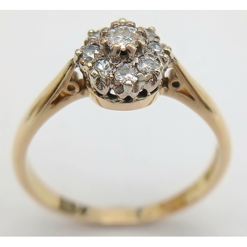 172 - A 18K YELLOW GOLD & PLATINUM VINTAGE DIAMOND CLUSTER RING. 0.25CT. TOTAL WEIGHT 3.2G. SIZE O AND 1/2... 