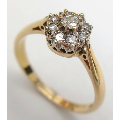 172 - A 18K YELLOW GOLD & PLATINUM VINTAGE DIAMOND CLUSTER RING. 0.25CT. TOTAL WEIGHT 3.2G. SIZE O AND 1/2... 