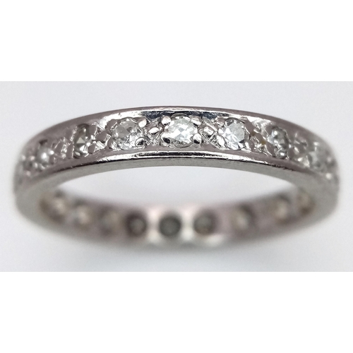 179 - A 18K WHITE GOLD DIAMOND SET FULL ETERNITY RING. 0.30CT. TOTAL WEIGHT 3.3G. SIZE M. Ref: SC 4080