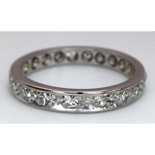 179 - A 18K WHITE GOLD DIAMOND SET FULL ETERNITY RING. 0.30CT. TOTAL WEIGHT 3.3G. SIZE M. Ref: SC 4080