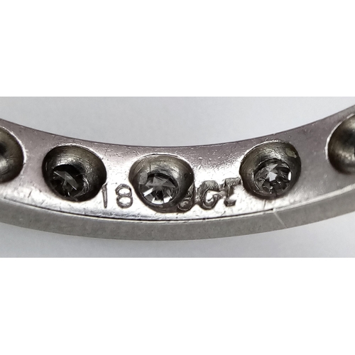 179 - A 18K WHITE GOLD DIAMOND SET FULL ETERNITY RING. 0.30CT. TOTAL WEIGHT 3.3G. SIZE M. Ref: SC 4080