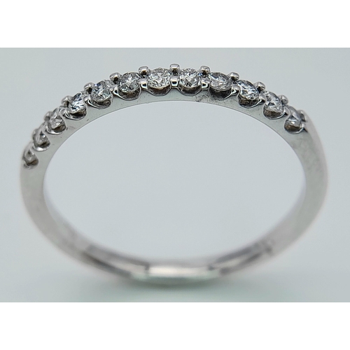 278 - A 18K WHITE GOLD DIAMOND SET 1/2 ET RING. 0.25CT. TOTAL WEIGHT 2.4G. SIZE P. Ref: SC 4070