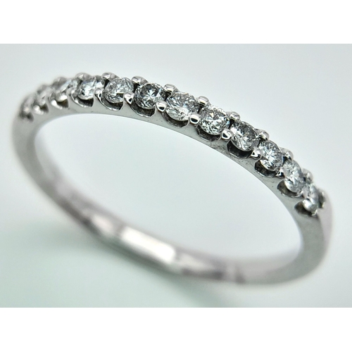 278 - A 18K WHITE GOLD DIAMOND SET 1/2 ET RING. 0.25CT. TOTAL WEIGHT 2.4G. SIZE P. Ref: SC 4070