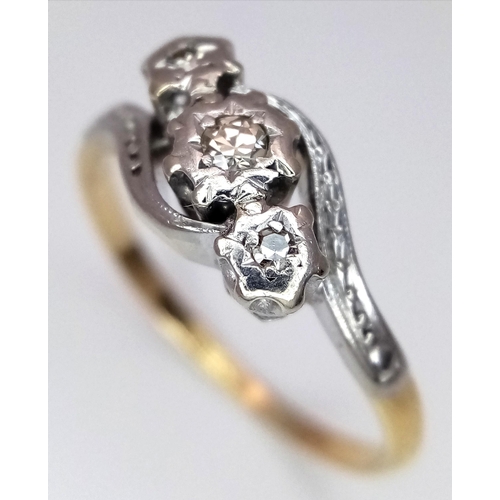 355 - A 18K YELLOW GOLD & PLATINUM VINTAGE DIAMOND TWIST RING. TOTAL WEIGHT 2.7G. SIZE O AND 1/2. Ref: SC ... 