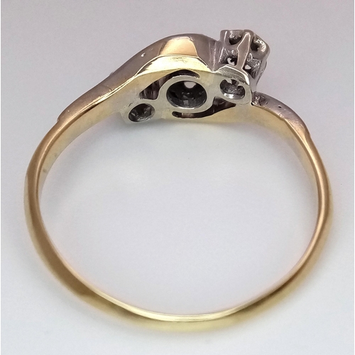 355 - A 18K YELLOW GOLD & PLATINUM VINTAGE DIAMOND TWIST RING. TOTAL WEIGHT 2.7G. SIZE O AND 1/2. Ref: SC ... 