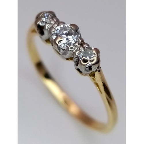 369 - A 18K YELLOW GOLD DIAMOND 3 STONE RING. 0.15CT. TOTAL WEIGHT 1.9G. SIZE J AND 1/2. Ref: SC 4086