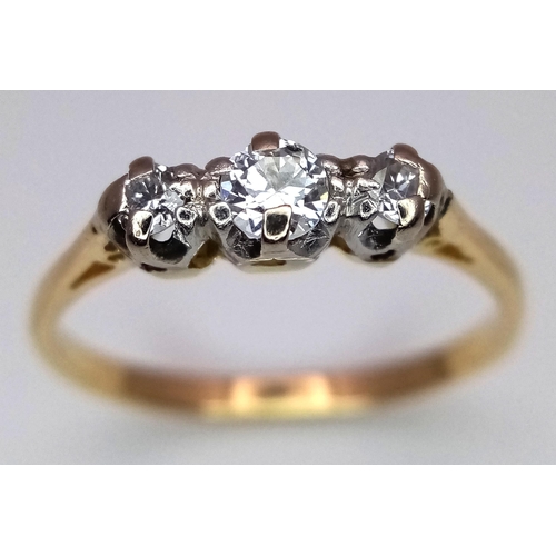 369 - A 18K YELLOW GOLD DIAMOND 3 STONE RING. 0.15CT. TOTAL WEIGHT 1.9G. SIZE J AND 1/2. Ref: SC 4086