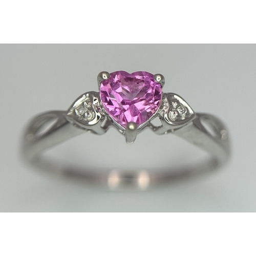 373 - A 9K WHITE GOLD DIAMOND & HEART SHAPED PINK SAPPHIRE RING. APPROX 0.55CT , 1.4G TOTAL WEIGHT , SIZE ... 