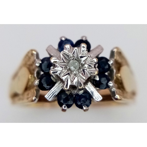 467 - A 9K YELLOW GOLD VINTAGE DIAMOND & SAPPHIRE RING, IN THE FLORAL DESIGN. 4G SIZE N. Ref: SC 4014