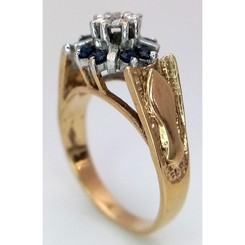 467 - A 9K YELLOW GOLD VINTAGE DIAMOND & SAPPHIRE RING, IN THE FLORAL DESIGN. 4G SIZE N. Ref: SC 4014