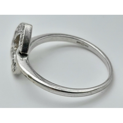 474 - A 9K WHITE GOLD STONE SET HEART RING 3.2G SIZE O. HEART CAN BE FLIPPED TO SHOW PLAIN HEART OPTION. R... 