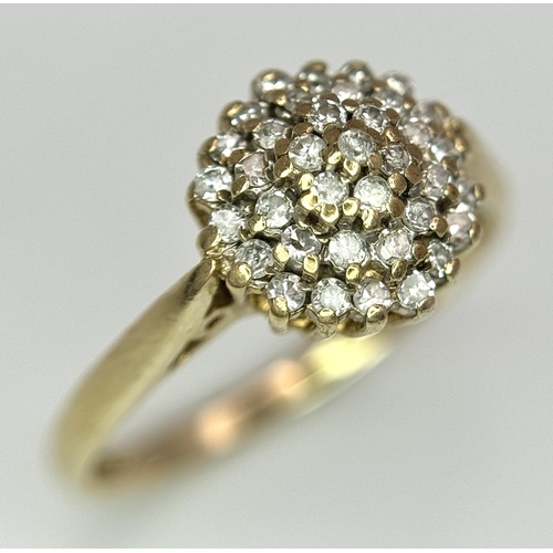 565 - A 9K YELLOW GOLD DIAMOND CLUSTER RING 0.25CT 2.1G SIZE M. Ref: SC 4021