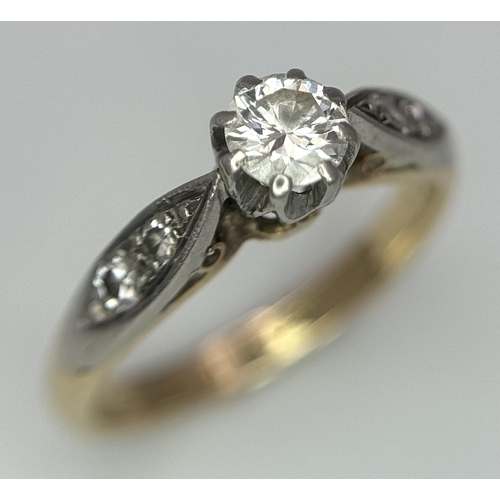 570 - An 18K Gold Bravingtons of London Vintage Diamond Ring. 0.30ct brilliant round cut central diamond w... 