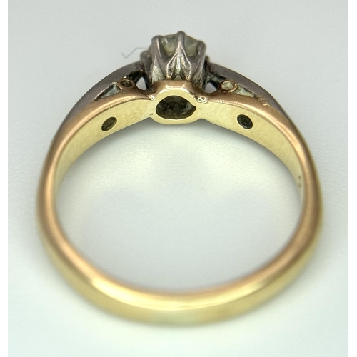 570 - An 18K Gold Bravingtons of London Vintage Diamond Ring. 0.30ct brilliant round cut central diamond w... 