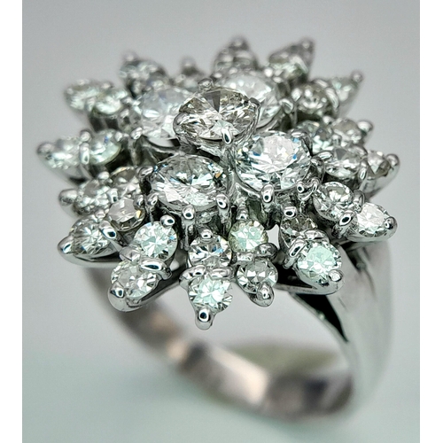 67 - A 18K WHITE GOLD DIAMOND CLUSTER RING. 1CT. TOTAL WEIGHT 6.7G. SIZE K. Ref: SC 4066