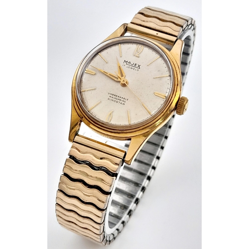 725 - A Vintage Men’s Swiss Made Gold Tone Manual Wind Watch by Majex. Model Kingstar-32mm Case. Unbreakab... 