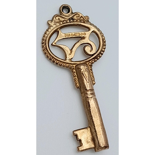 837 - A 9K Yellow Gold '21' Key Pendant/Charm. 35mm. 1.15g