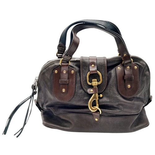 305 - A Chloe leather Kerala Bag. Dark brown leather exterior, gold and silver toned hardware, double leat... 