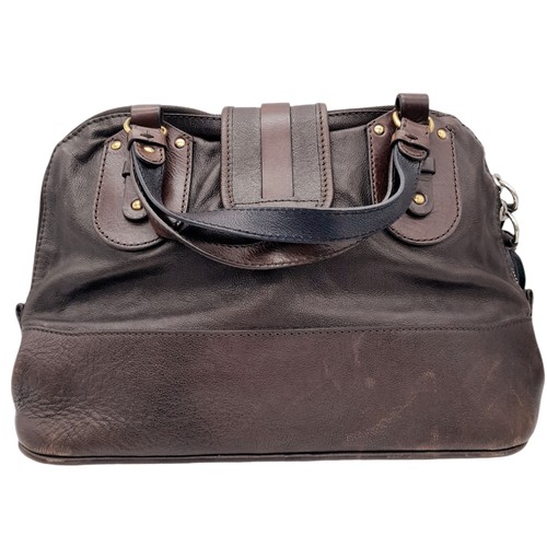 305 - A Chloe leather Kerala Bag. Dark brown leather exterior, gold and silver toned hardware, double leat... 