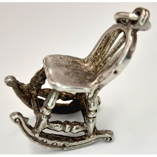 1014 - A STERLING SILVER ROCKING CHAIR CHARM. TOTAL WEIGHT. 2.6G. Ref: SC 4105