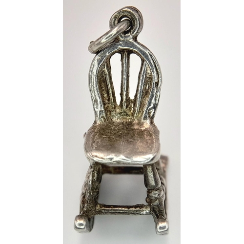 1014 - A STERLING SILVER ROCKING CHAIR CHARM. TOTAL WEIGHT. 2.6G. Ref: SC 4105