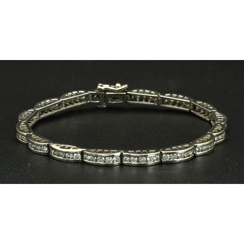 11 - A 14K WHITE GOLD DIAMOND SET BRACELET 1CT APPROX 15.4G IN WEIGHT, 18CM IN LENGTH. Ref: SC 4054