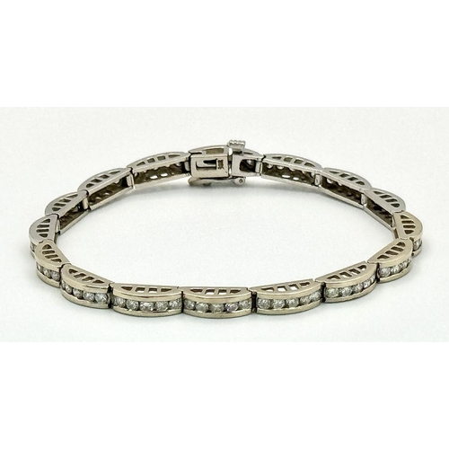 11 - A 14K WHITE GOLD DIAMOND SET BRACELET 1CT APPROX 15.4G IN WEIGHT, 18CM IN LENGTH. Ref: SC 4054