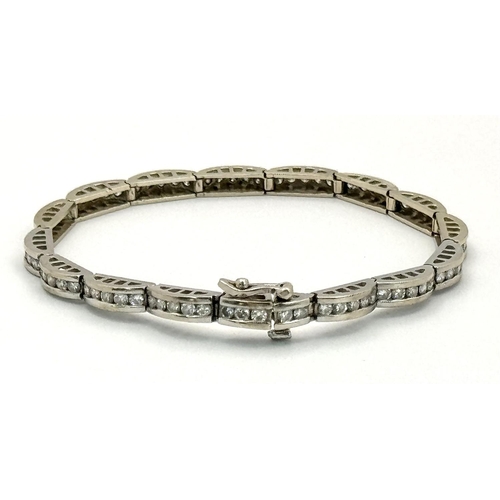 11 - A 14K WHITE GOLD DIAMOND SET BRACELET 1CT APPROX 15.4G IN WEIGHT, 18CM IN LENGTH. Ref: SC 4054