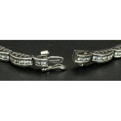 11 - A 14K WHITE GOLD DIAMOND SET BRACELET 1CT APPROX 15.4G IN WEIGHT, 18CM IN LENGTH. Ref: SC 4054