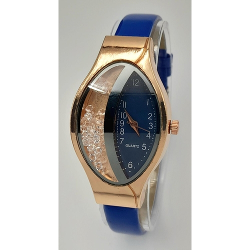 140 - A rose gold plated, very glamorous and unusual ladies watch, case: 48 x 27 mm, dial: half with blue ... 