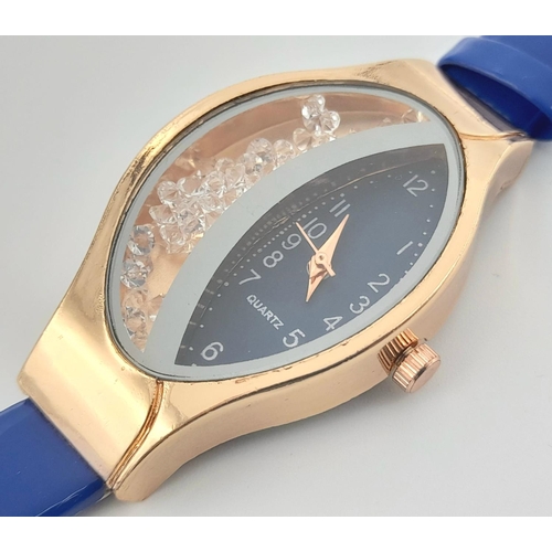 140 - A rose gold plated, very glamorous and unusual ladies watch, case: 48 x 27 mm, dial: half with blue ... 