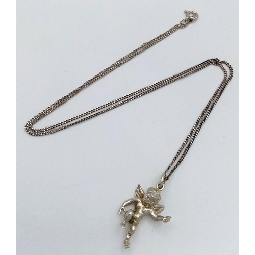 1433 - A silver cherub pendant on 925 silver chain. Total weight 4.6G. Total length 48cm.