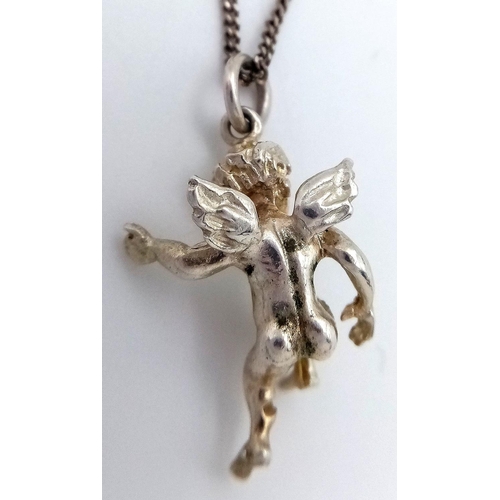 1433 - A silver cherub pendant on 925 silver chain. Total weight 4.6G. Total length 48cm.