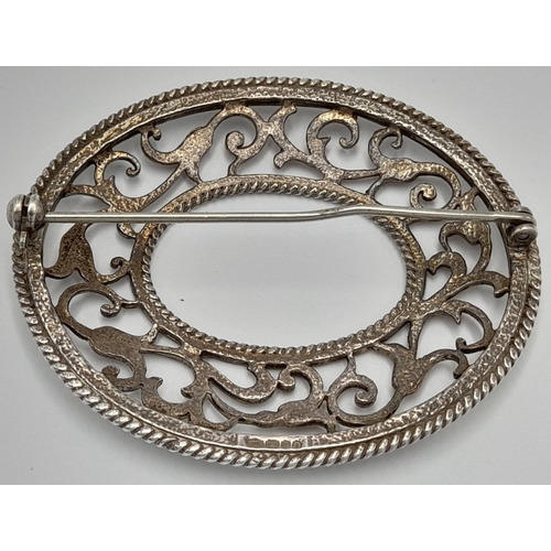 1447 - A vintage sterling silver Celtic design brooch. Full London hallmarks, 1973. Total weight 15.8G. Wid... 