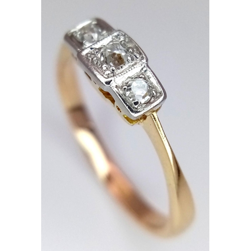 193 - A 18K YELLOW GOLD & PLATINUM VINTAGE 3 STONE DIAMOND RING. TOTAL WEIGHT 2.8G. SIZE O. Ref: SC 4075