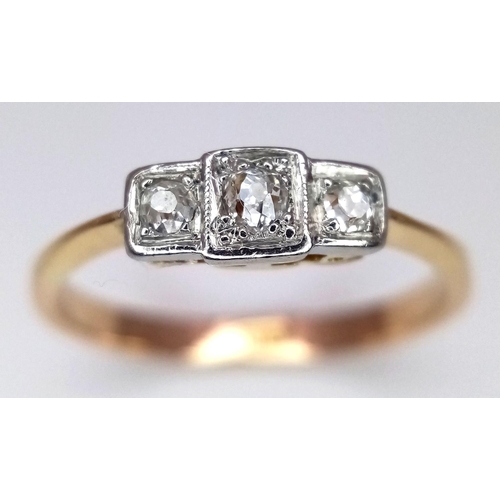 193 - A 18K YELLOW GOLD & PLATINUM VINTAGE 3 STONE DIAMOND RING. TOTAL WEIGHT 2.8G. SIZE O. Ref: SC 4075