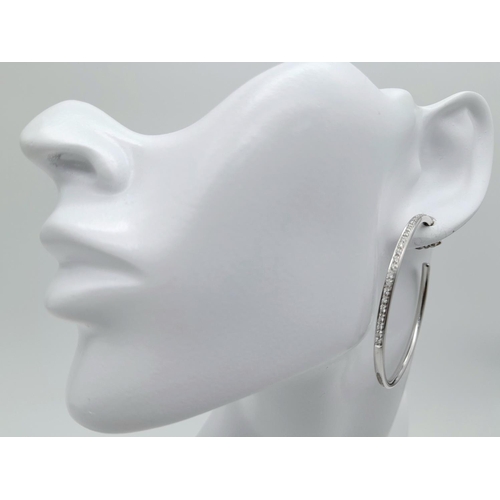 20 - A 18K WHITE GOLD DIAMOND SET HOOP EARRINGS BY DESIGNER LEO PIZZO. TOTAL WEIGHT 11.1G. Ref: SC 4072