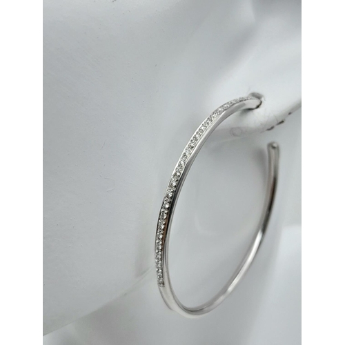 20 - A 18K WHITE GOLD DIAMOND SET HOOP EARRINGS BY DESIGNER LEO PIZZO. TOTAL WEIGHT 11.1G. Ref: SC 4072