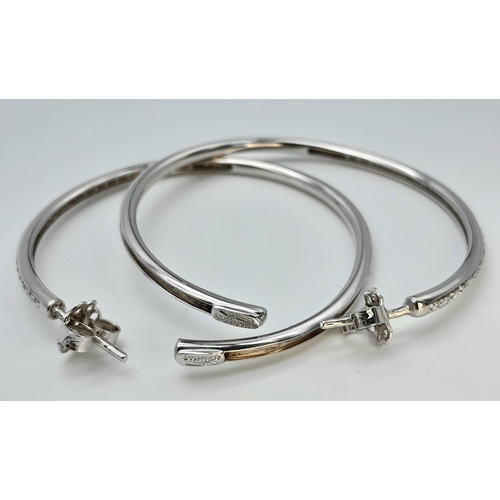 20 - A 18K WHITE GOLD DIAMOND SET HOOP EARRINGS BY DESIGNER LEO PIZZO. TOTAL WEIGHT 11.1G. Ref: SC 4072