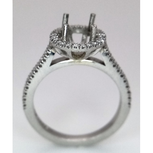 208 - A NEW PLATINUM DIAMOND SET HALO STYLE RING, MOUNT READY TO SET YOUR DREAM CENTRE STONE. 0.25CT , 4.6... 