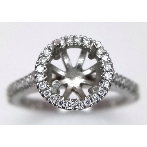 208 - A NEW PLATINUM DIAMOND SET HALO STYLE RING, MOUNT READY TO SET YOUR DREAM CENTRE STONE. 0.25CT , 4.6... 