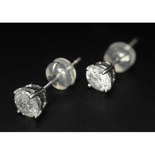 240 - A Pair of 18K White Gold Diamond Stud Earrings. 0.94ctw of brilliant round cut diamonds. 0.96g total... 