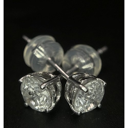 240 - A Pair of 18K White Gold Diamond Stud Earrings. 0.94ctw of brilliant round cut diamonds. 0.96g total... 