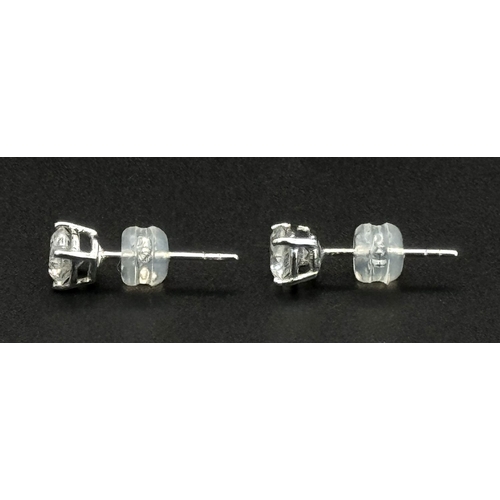 240 - A Pair of 18K White Gold Diamond Stud Earrings. 0.94ctw of brilliant round cut diamonds. 0.96g total... 