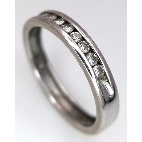 257 - A 18K WHITE GOLD DIAMOND BAND RING. 0.15CT. TOTAL WEIGHT 2.7G. SIZE L. Ref: SC 4064