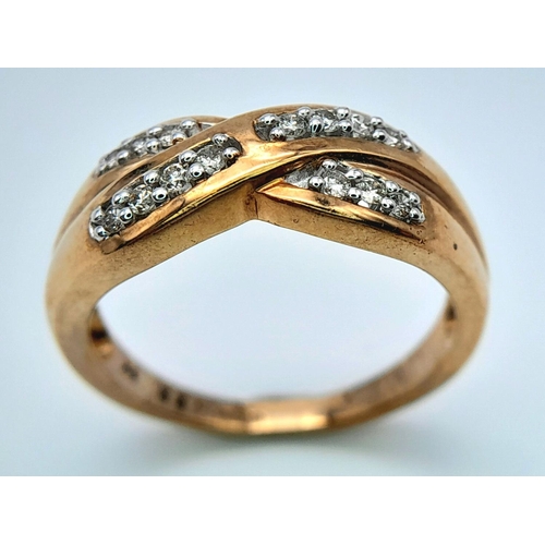 460 - A 9K YELLOW GOLD DIAMOND SET CROSSOVER KISS RING 4.3G SIZE Q. Ref: SC 4013