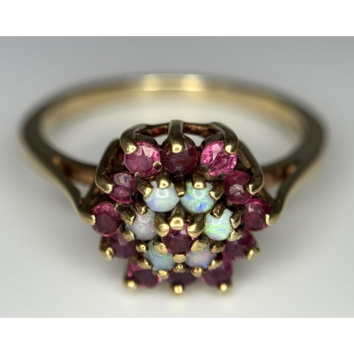 481 - A 9K YELLOW GOLD RUBY & OPAL CLUSTER RING 2.6G SIZE O. Ref: SC 4017