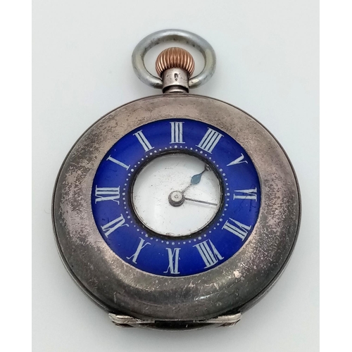 542 - An Antique 935 Silver and Enamel Ladies Half-Hunter Pocket Watch. 4cm diameter. White dial. Top wind... 