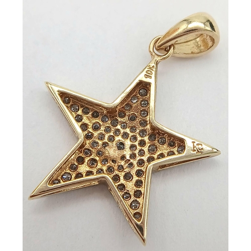 677 - A 9K YELLOW GOLD DIAMOND SET STAR PENDANT. 0.25CT , 25MM X 19MM , 1.3G TOTAL WEIGHT. Ref: SC 4012